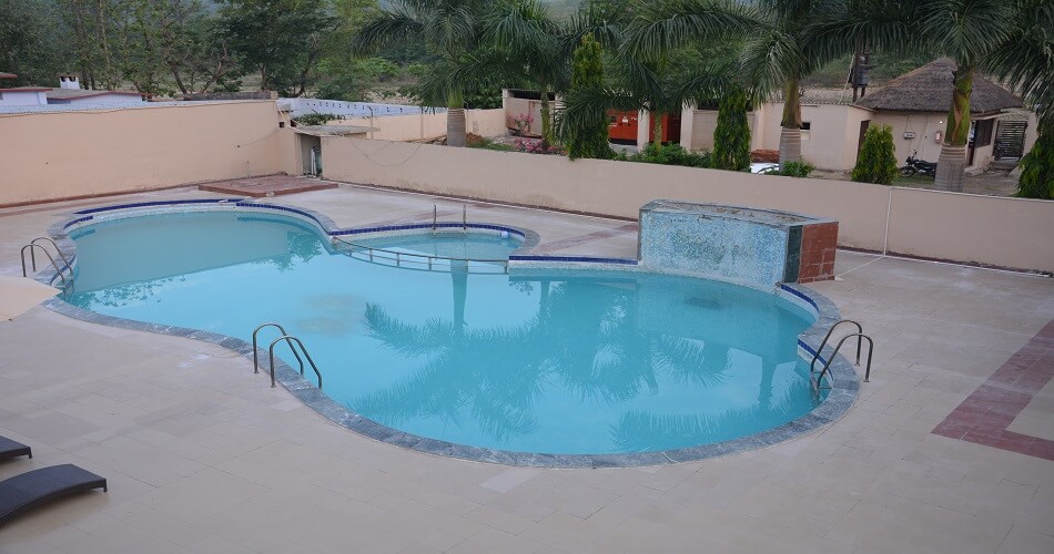 luxury resort swimming pool corbett ramnagar