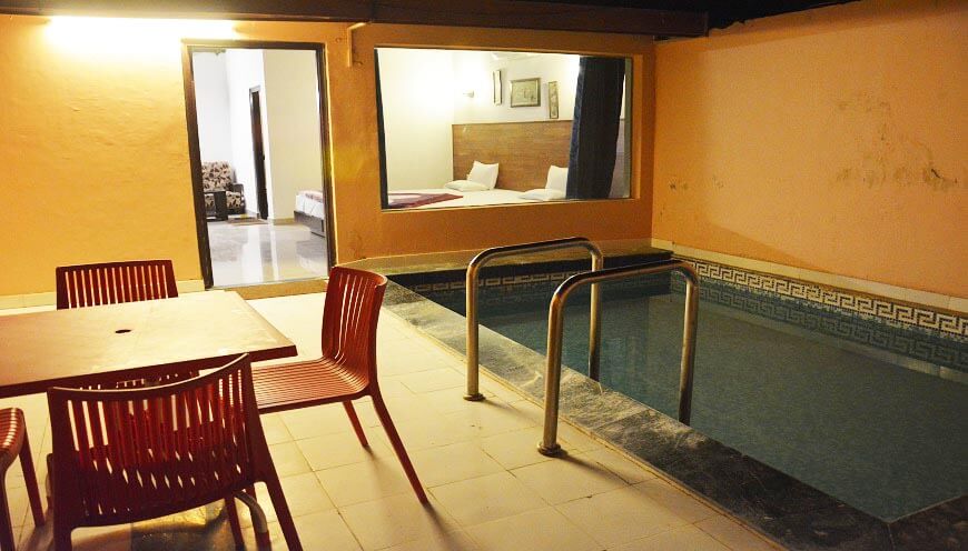 luxury resort room swimming pool in jim corbett 